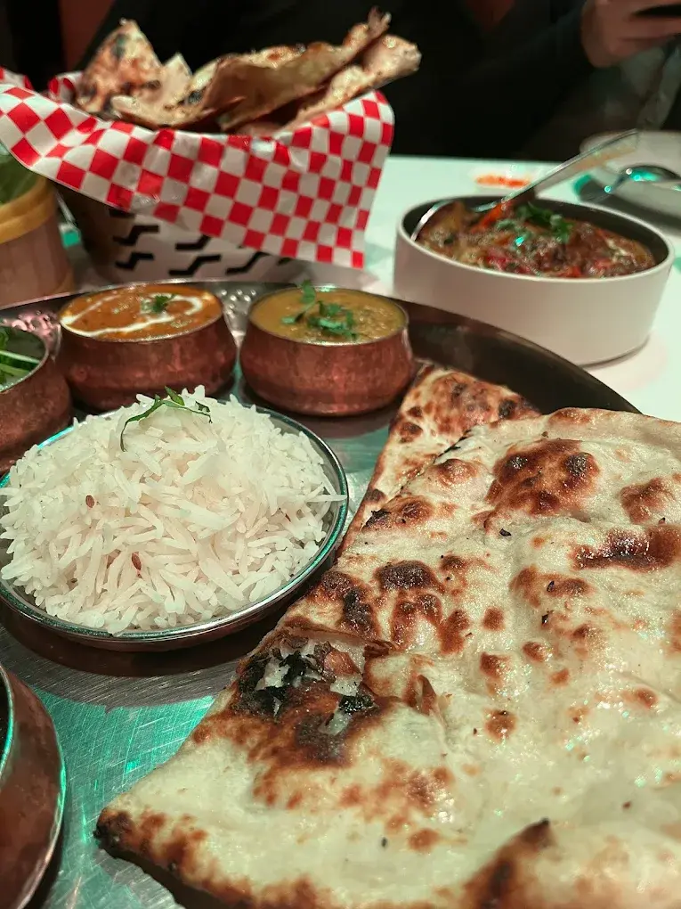 Traditional North Indian dishes including butter chicken and biryani at Aanchal Indian Restaurant Griesbach Edmonton